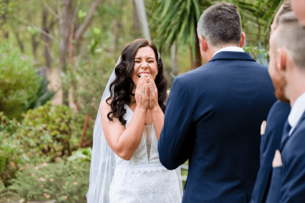 1 bride laughing during ceremony at Rothwood Weddings in Perth