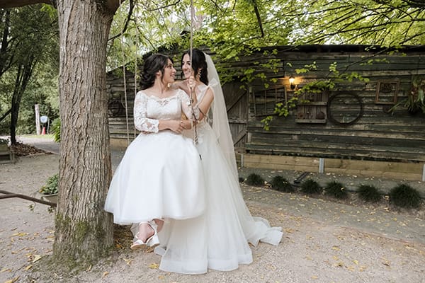 bride and bride on swing after wedding bride and bride on swing after wedding