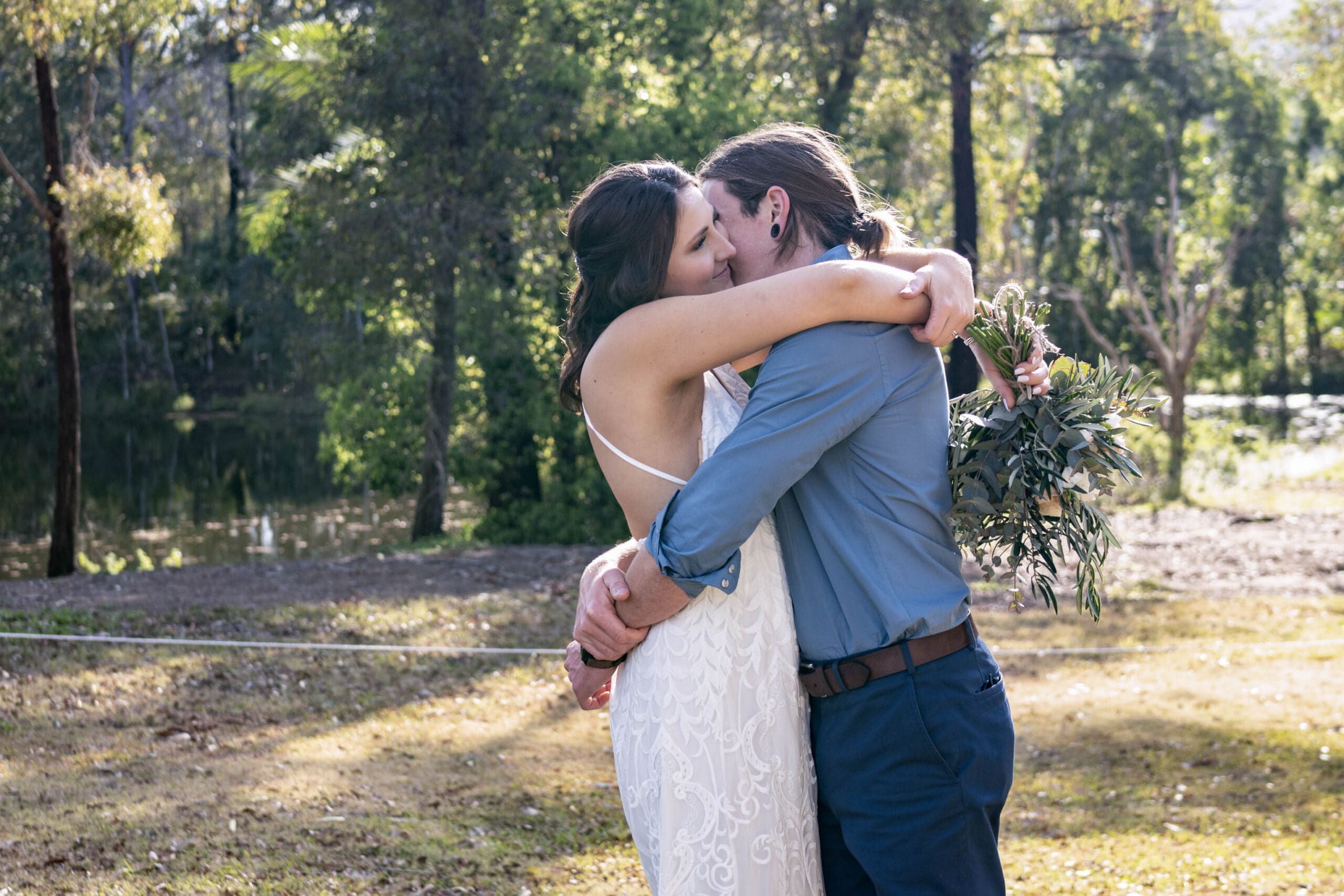 couple hugging at wedding in Brisbane