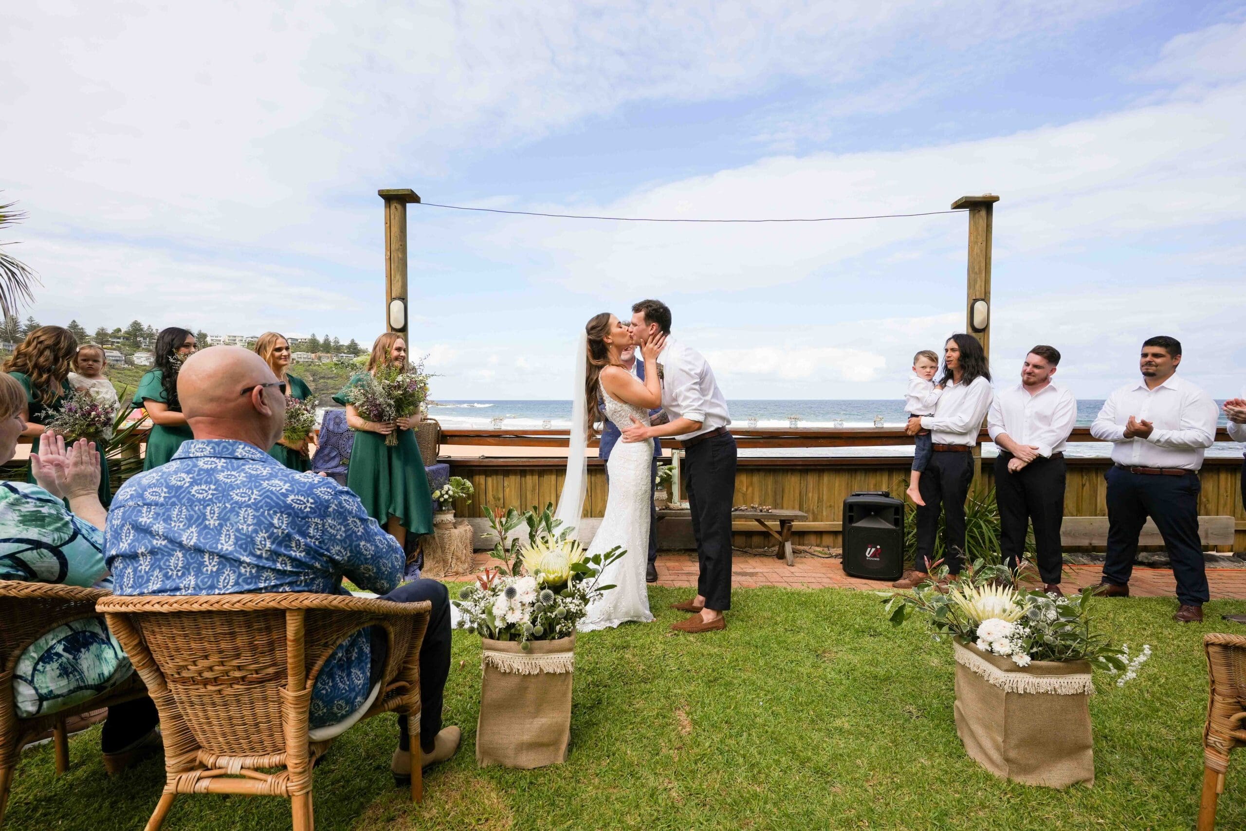 bride and groom first kiss at Sydney wedding