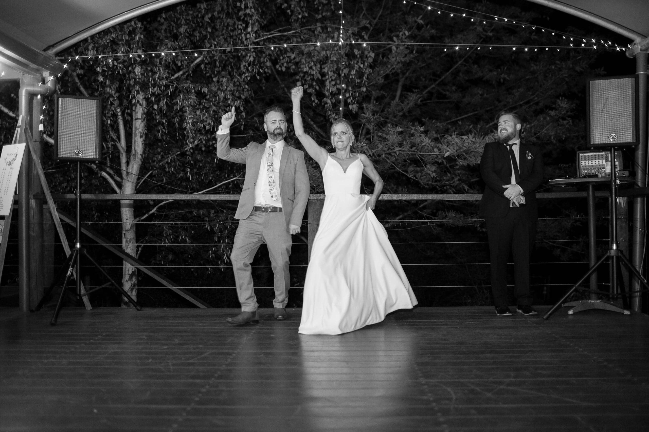 black and white photo of bride and groom during first dance