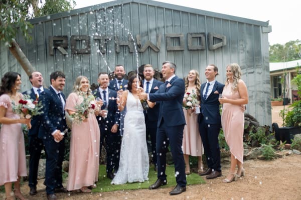 champagne pop at wedding in Perth