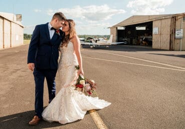 Bride and groom airport wedding photo